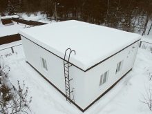 Проекты современных домов с плоской крышей: особенности выбора и обустройства кровли